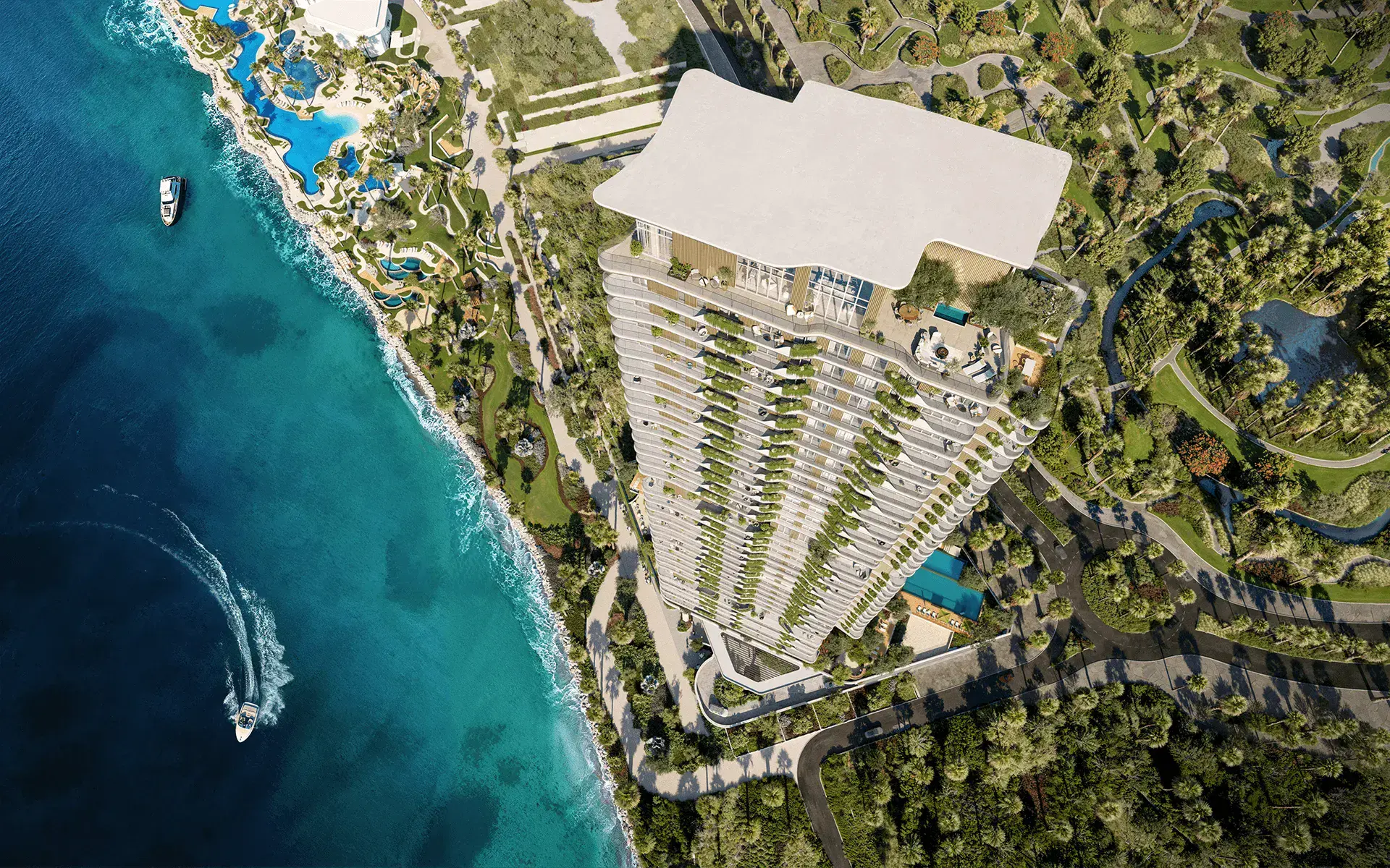Aerial view of The Mural tower between the forest and the coastline