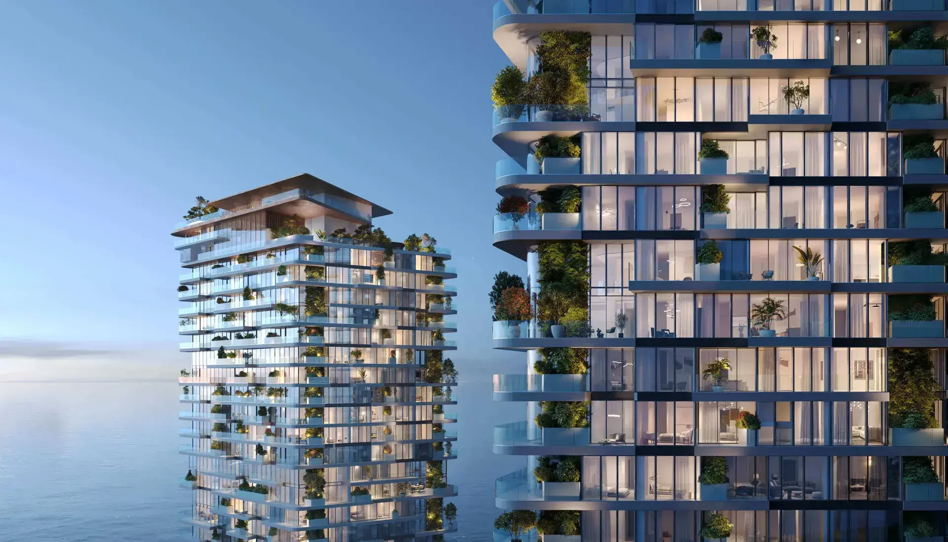Soulever's two towers with planted balconies by the sea